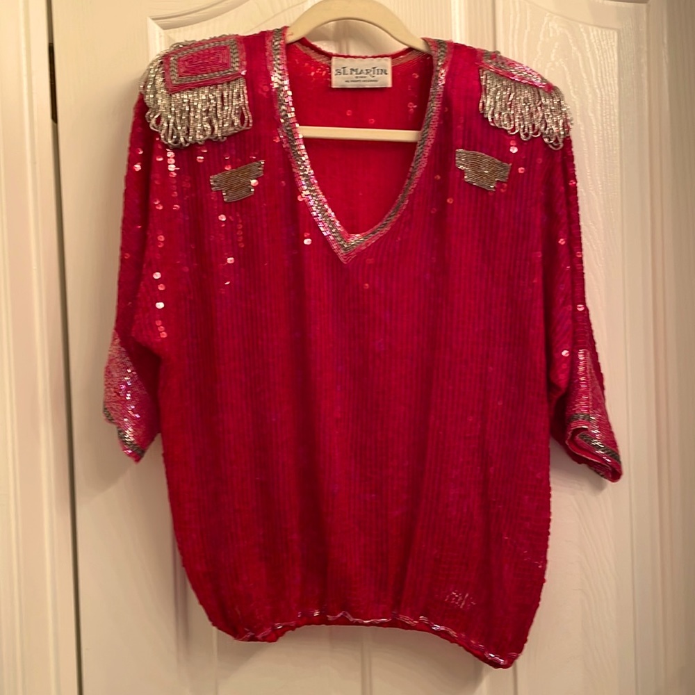 Vintage sequined. Padded shoulders. A bit sheer, just enough to be sexy.